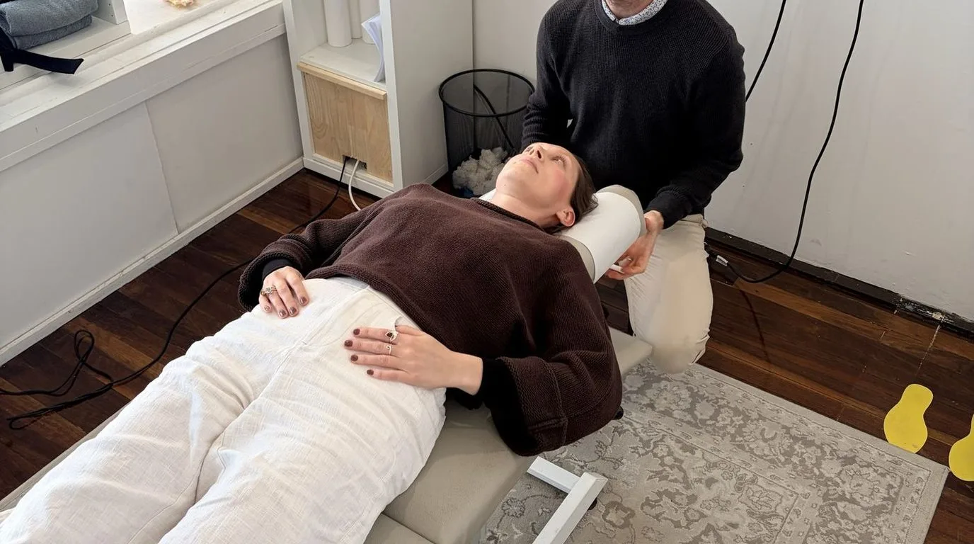 A chiropractor treating a patient